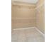 A walk-in closet with wire shelving and tile flooring is perfect for storage at 3001 Bellingham Dr, Orlando, FL 32825