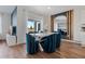 Contemporary dining room featuring modern decor, luxury vinyl plank flooring, and lots of light at 3178 Partington Blvd, Davenport, FL 33837