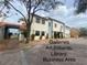 Building exterior with lush landscaping at 321 Davinci Pass, Kissimmee, FL 34759