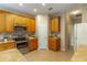 Spacious kitchen with stainless steel appliances and tile flooring at 321 Davinci Pass, Kissimmee, FL 34759