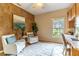 Inviting home office with stylish decor, a large window, and a built-in desk at 321 Davinci Pass, Kissimmee, FL 34759