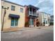 Attractive storefront with a balcony, colorful accents, and inviting entrance at 321 Davinci Pass, Kissimmee, FL 34759
