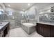 Beautiful bathroom with an elegant soaking tub and a separate glass shower at 3930 Hydrangea Ct, Oviedo, FL 32766
