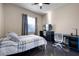 Bedroom with a comfortable bed and a modern desk setup at 3930 Hydrangea Ct, Oviedo, FL 32766