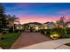 Beautiful single-story home featuring a large brick driveway and meticulously manicured landscaping at 3930 Hydrangea Ct, Oviedo, FL 32766
