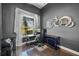Modern home office with a large window, contemporary decor, and plenty of desk space at 3930 Hydrangea Ct, Oviedo, FL 32766