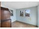 Cozy bedroom with two windows and light blue walls at 425 S Woodland St, Winter Garden, FL 34787