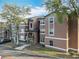 Exterior view of an apartment building, highlighting its architectural details and landscaping in a serene neighborhood setting at 4540 Commander Dr # 2236, Orlando, FL 32822