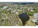 Great aerial view of the community with beautiful pond and fountain at 478 Green Spring Cir, Winter Springs, FL 32708