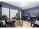 Gaming room features multiple desks with gaming chairs and monitors at 5251 Wildwood Way, Davenport, FL 33837