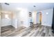 Spacious loft area showcases modern flooring and versatile space for relaxation and recreation at 5251 Wildwood Way, Davenport, FL 33837