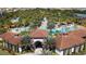 Community pool with a lazy river, splash pad, waterslide, plenty of seating and lounge chairs at 5251 Wildwood Way, Davenport, FL 33837