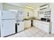 Laundry room features modern appliances and ample countertop space at 601 Washington Palm Loop, Davenport, FL 33897