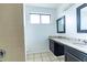 Bathroom with a double vanity with granite countertop at 7440 Windsome Ct, Orlando, FL 32810