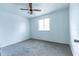 Bedroom with neutral carpet, a ceiling fan, and natural light at 7440 Windsome Ct, Orlando, FL 32810