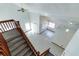 View from second floor stairs of open concept first floor at 7440 Windsome Ct, Orlando, FL 32810