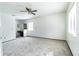 Neutral primary bedroom features carpeted floors, neutral walls, and a vanity area at 7440 Windsome Ct, Orlando, FL 32810