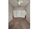 Spacious bedroom featuring a ceiling fan and neutral-colored walls and plush carpeting at 7741 Bardmoor Hill Cir, Orlando, FL 32835