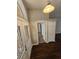Welcoming entryway featuring decorative glass door, hardwood floors, and high ceiling at 7741 Bardmoor Hill Cir, Orlando, FL 32835