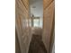 Hallway with a view to the patio and pool at 7741 Bardmoor Hill Cir, Orlando, FL 32835