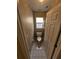 Cozy powder room with neutral walls, tile flooring, a small window, and standard toilet at 7741 Bardmoor Hill Cir, Orlando, FL 32835