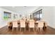 Spacious dining room featuring a long wood table and seating for ten, perfect for entertaining guests at 900 W Plant St, Winter Garden, FL 34787