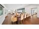 An expansive dining room adjacent to the living area features hardwood floors and abundant natural light at 900 W Plant St, Winter Garden, FL 34787