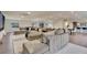 Spacious and light-filled living room open to kitchen area at 900 W Plant St, Winter Garden, FL 34787