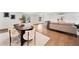 Open concept living room with hardwood floors and dining area at 900 W Plant St, Winter Garden, FL 34787