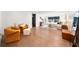 Spacious main bedroom with hardwood floors, sitting area, and plenty of natural light at 900 W Plant St, Winter Garden, FL 34787