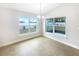 Dining area features lots of natural light and a modern chandelier at 947 Cumberland Dr, Kissimmee, FL 34759
