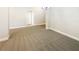 Bright dining room with neutral walls, carpet floors, and modern lighting at 947 Cumberland Dr, Kissimmee, FL 34759