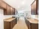 Beautiful kitchen featuring stainless steel appliances and tile flooring at 947 Cumberland Dr, Kissimmee, FL 34759