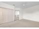 Bedroom with a ceiling fan and double-door closet at 10616 Emerald Chase Dr, Orlando, FL 32836