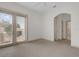 Bedroom featuring carpet floors and a glass door for natural light at 10616 Emerald Chase Dr, Orlando, FL 32836