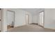 Bedroom with carpet flooring and access to an adjacent bathroom at 10616 Emerald Chase Dr, Orlando, FL 32836