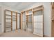 Walk-in closet featuring custom shelving and storage solutions for organization at 10616 Emerald Chase Dr, Orlando, FL 32836