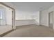 Upstairs loft featuring neutral walls and carpet flooring at 10616 Emerald Chase Dr, Orlando, FL 32836