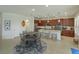 Open kitchen and dining area with lots of counter space and windows for natural light at 1077 Fountain Coin Loop, Orlando, FL 32828