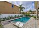 Gorgeous pool with sun shelf and lush tropical landscaping offering privacy at 1077 Fountain Coin Loop, Orlando, FL 32828