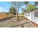 Backyard featuring a new fence and established landscaping at 1300 Montego Ln, Orlando, FL 32807