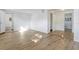 Spacious bedroom with wood-look floors and ample closet space at 1300 Montego Ln, Orlando, FL 32807