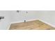 Clean laundry room featuring new flooring, dryer connection, and washer hookups at 1300 Montego Ln, Orlando, FL 32807
