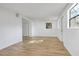 Large living room with new flooring, recessed lighting, and neutral paint at 1300 Montego Ln, Orlando, FL 32807