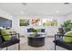Bright living room with modern décor, stylish seating, and decorative artwork creating a cozy atmosphere at 1300 Montego Ln, Orlando, FL 32807