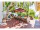 Charming backyard patio with dining space and gazebo at 1400 Tedford St, Eustis, FL 32726