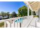 Balcony view showcasing the pool and lake, perfect for outdoor relaxation at 1400 Tedford St, Eustis, FL 32726