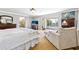 Bright main bedroom with large windows overlooking serene views at 1400 Tedford St, Eustis, FL 32726