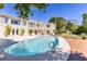 Beautiful outdoor pool with the home in the background at 1400 Tedford St, Eustis, FL 32726