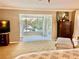 Relaxing sitting area with large windows and a view of the nearby lake at 1400 Tedford St, Eustis, FL 32726